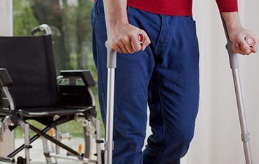 Workers Comp Lawyer Page Image - Wheelchair & crutches