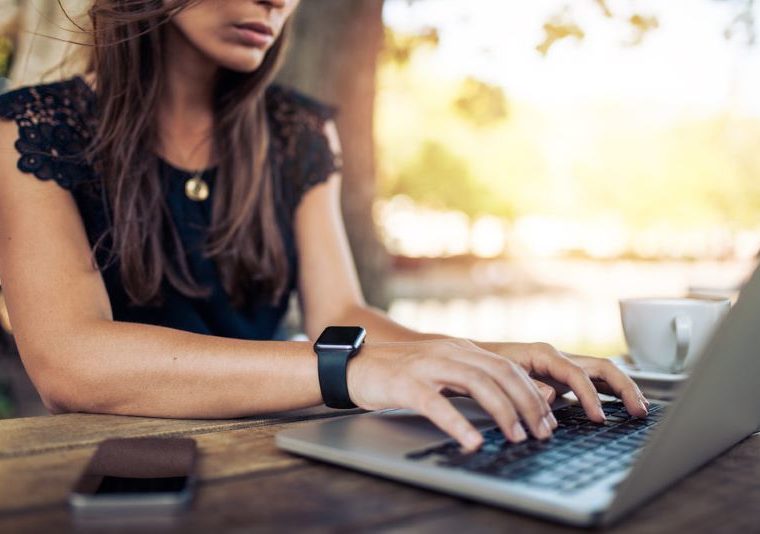 woman filling out workers compensation form online