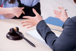 Injured employee visiting lawyer for advice on insurance